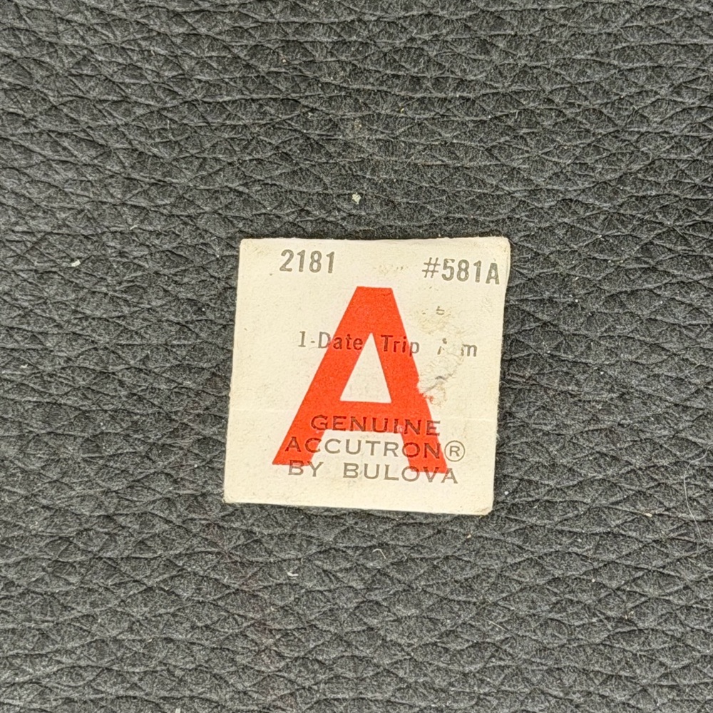 NOS Genuine Accutron by Bulova Watch Part.  A2181 #581A.  Date Trip Arm.